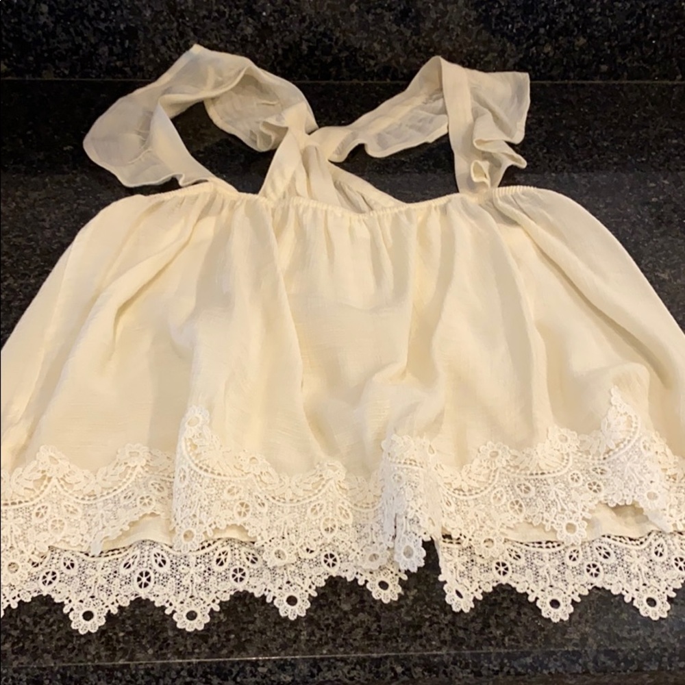 New cream sleeveless blouse by Mine Lace bottom